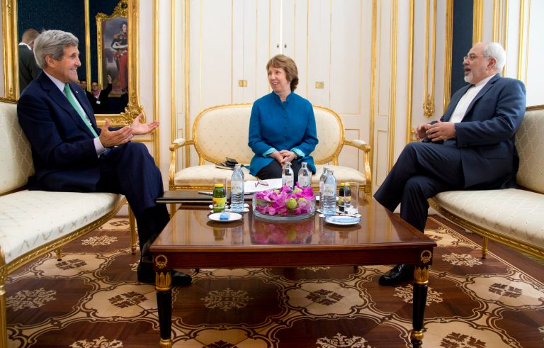 From left, U.S. Secretary of State John Kerry, European Union High Representative Catherine Ashton, and Iranian Foreign Minister Mohammad Javad Zarif are photographed as they participate in a trilateral meeting in Vienna, Austria, Wednesday, Oct. 15, 2014. The three will try and advance nuclear talks and meet the target date of Nov. 24. But with less than six weeks left until Nov. 24, there may be no alternative than to prolonging them. (AP Photo/Carolyn Kaster, Pool)