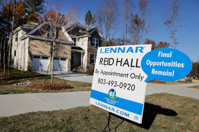 In this Thursday, Nov. 14, 2013, photo, a home is advertised for sale in Matthews, N.C. The National Association of Realtors reports on sales of previously occupied homes in October on Wednesday, Nov. 20, 2013. (AP Photo/Chuck Burton)