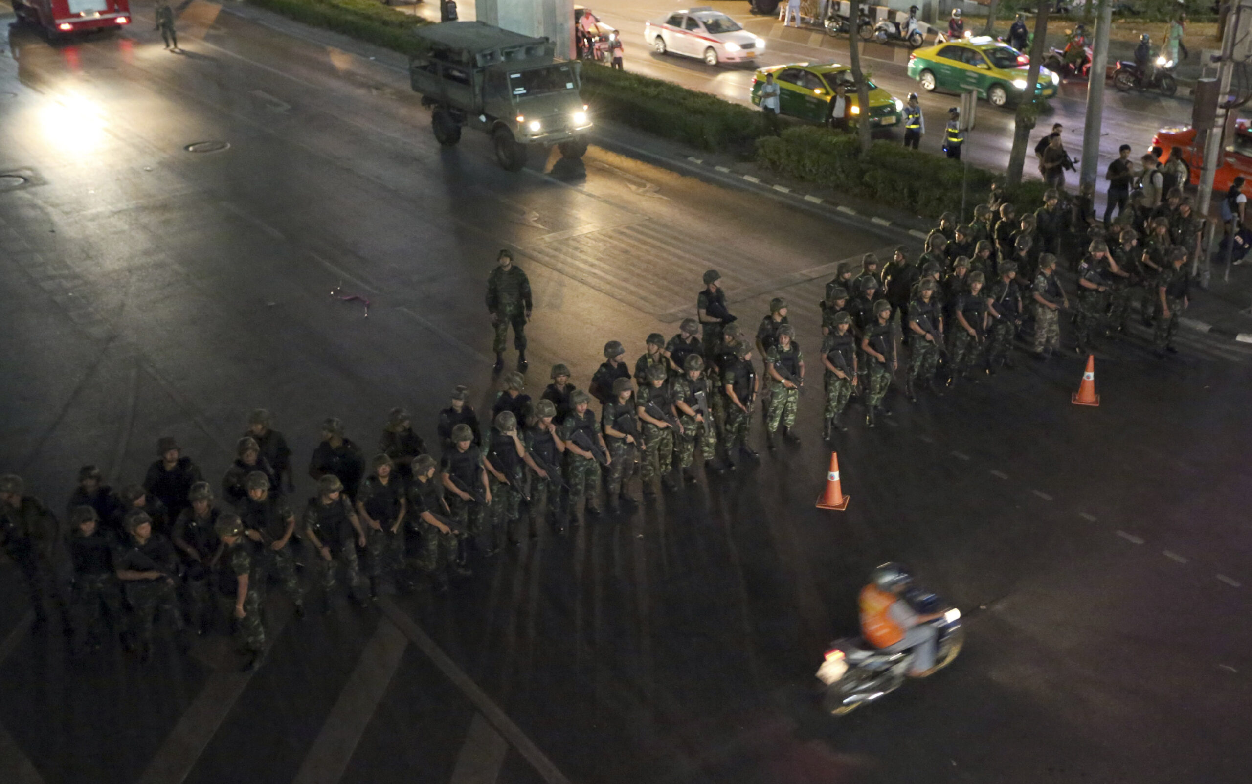 Thai army: Ex-PM, protest leaders held ‘to think’