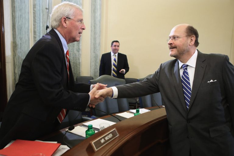 WASHINGTON, DC - DECEMBER 06:  Senate Surface Transportation and Merchant Marine Infrastructure, Safety, and Security Subcommittee member U.S. Sen. Roger Wicker (R-MS) greets Metropolitan Transportation Authority Chairman and CEO Joseph Lhota before a hearing on 