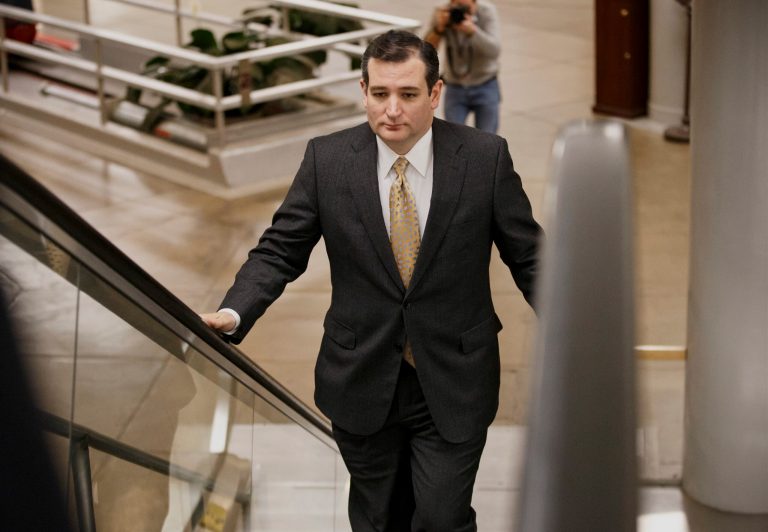 Sen. Ted Cruz, R-Texas arrives on Capitol Hill in Washington, Wednesday, Feb. 12, 2014, as senators go to the chamber for a vote to extend the Treasury's borrowing authority. Congress appears on track to send President Barack Obama must-do legislation to extend Treasury's borrowing authority without any concessions from the White House. (AP Photo/J. Scott Applewhite)