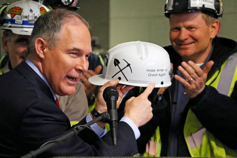 Agency chief visits coal-fired power plant that was expected to close under Obama's environmental regulations. (AP Photo/Gene J. Puskar)