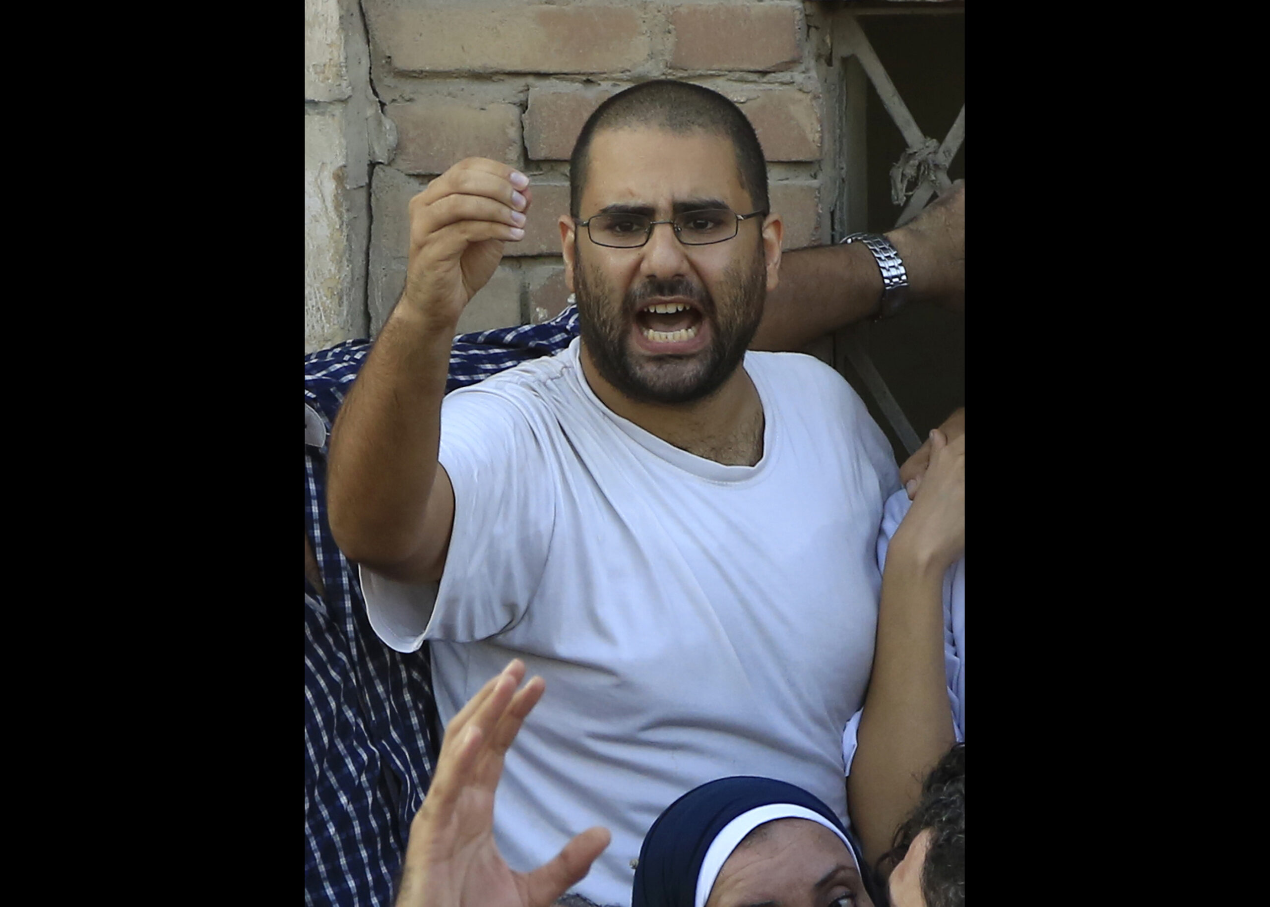 Egypt prosecutors show court activist’s home video
