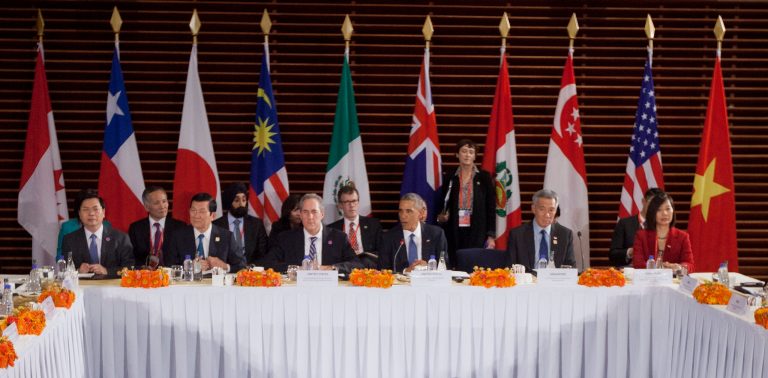 U.S. President Barack Obama, center, speaks during his meeting with leaders of the Trans-Pacific Partnership countries, Monday, Nov. 10, 2014 in Beijing. Sitting with Obama are from left to right Vietnam Minister of Industry and Trade Vu Hoy Hoang, Vietnam Prime Minister Nguyen Tan Dung, U.S. Trade Representative Ambassador Mike Froman, Singapore Prime Minister Lee Hsien Loong, and Singapore Sec. of Ministry of Trade and Industry Ow Foong Pheng. (AP Photo/Pablo Martinez Monsivais)