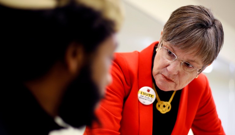 Democratic candidate for Kansas governor, Laura Kelly, listens to a question during a rally at the New Bethel Church Saturday, Nov. 3, 2018, in Kansas City, Kan.