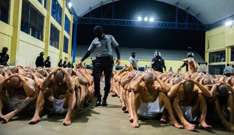 The arrival of inmates belonging to the MS-13 and 18 gangs to the Centro de Confinamiento del Terrorismo in Tecoluca, 46 miles southeast of San Salvador, Feb. 25, 2023. The first group of 2,000 suspected gang members in El Salvador has been moved to a huge new prison, the centerpiece of Salvadoran President Nayib Bukele's self-declared war on crime. Tens of thousands of suspected gangsters have been rounded up in the country under a state of emergency following a spike in murders and other violent crimes.