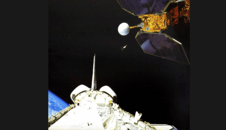 In this photo made available by NASA, the space shuttle Challenger launches the Earth Radiation Budget Satellite in 1984. On Friday, Jan. 6, 2023, the U.S. space agency said the 38-year-old NASA satellite is about to fall from the sky, but the chance of wreckage falling on anybody is âvery low.â It's expected to come down Sunday night, give or take 17 hours.