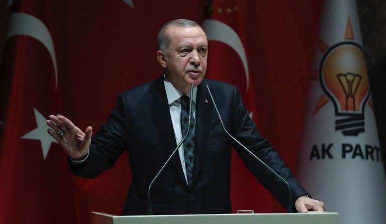Turkey's President Recep Tayyip Erdogan speaks to his ruling party officials, in Ankara, Turkey, Thursday, Oct. 10, 2019. 