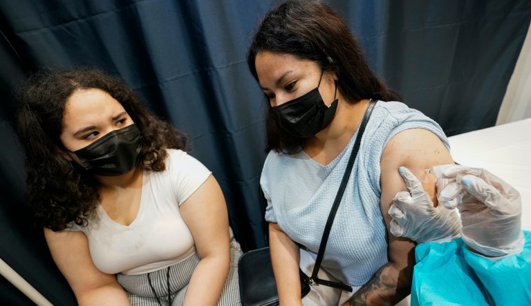 Vaccine mandates gain momentum with backing from governments and Veterans Affairs