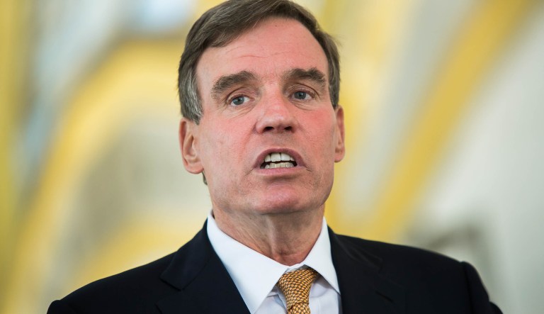 Sen. Mark Warner, D-VA, speaks at a news conference in Arlington, Va. 
