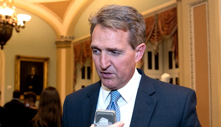 Sen. Jeff Flake, R-Ariz., takes questions from reporters on Capitol Hill in D.C.