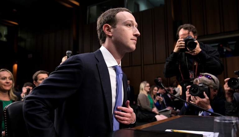 Facebook CEO Mark Zuckerberg arrives to testify before a joint hearing of the Commerce and Judiciary Committees in Washington, D.C., on April 10, 2018.