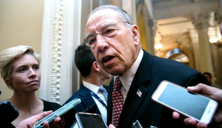 Sen. Chuck Grassley takes questions from reporters on Capitol Hill.