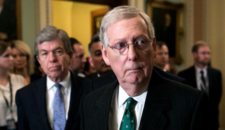 Senate Majority Leader Mitch McConnell, R-Ky., takes questions at a press conference on Capitol Hill on Wednesday.