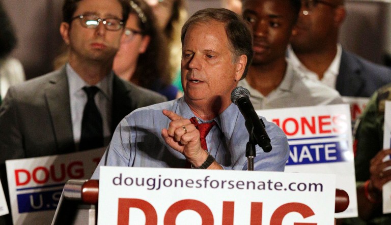 Democrat Doug Jones released a new TV ad featuring a number of Republican voters in the state saying that they can't vote for Roy Moore for a number of reasons. (AP Photo/Brynn Anderson)
