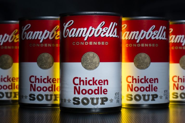 In this Wednesday, Jan. 8, 2014, photo, cans of Campbell's soup are photographed in Washington.  Campbell Soup reported a higher quarterly profit on Friday, Feb. 14, 2014, as U.S. soup sales rose 5 percent. (AP Photo/J. David Ake)