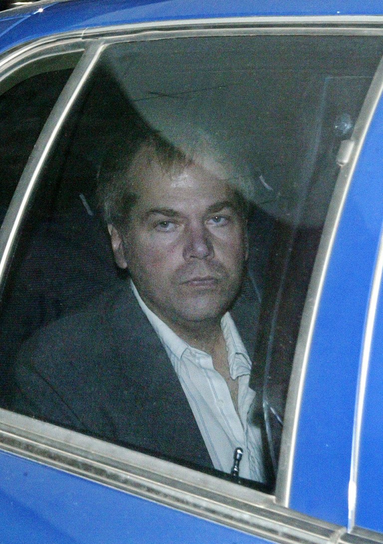 FILE - In this Nov. 18, 2003 file photo, John Hinckley Jr. arrives at U.S. District Court in Washington.  A judge has ruled that the man who attempted to assassinate President Ronald Reagan will get to spend more time outside a mental hospital where he has been confined for most of the past three decades.  Hinckley will be allowed to visit his mother's home in Williamsburg, Va., for up to 17 days at a time.  Hinckley has been allowed to spend increasing amounts of time at his mother's house in recent years, but previous visits were capped at 10 days.    (AP Photo/Evan Vucci, File)