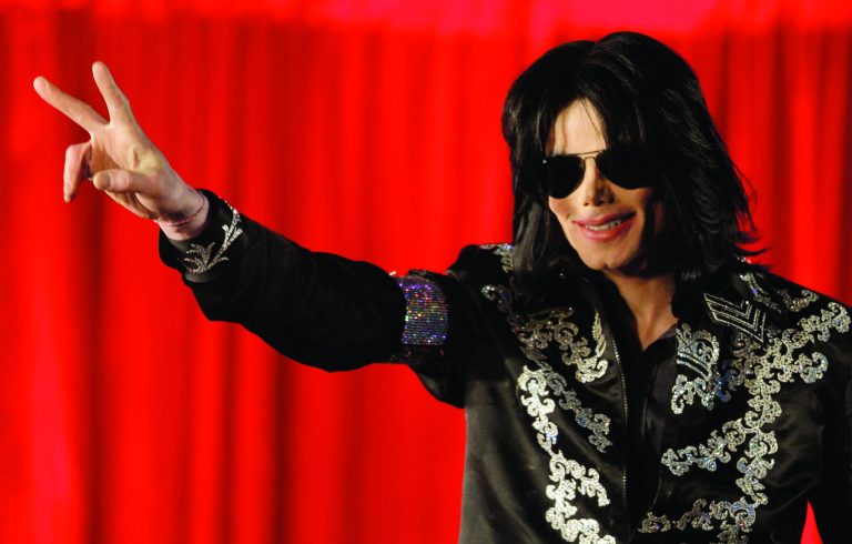 FILE - In a March 5, 2009 file photo US singer Michael Jackson announces that he is set to play ten live concerts at the London O2 Arena in July, which he announced at a press conference at the London O2 Arena. A trial scheduled to begin Tuesday, Sept. 6, 2012 will determine how much a businessman working with Katherine Jackson will have to pay her son's estate for infringing some of its copyrights. (AP Photo/Joel Ryan, File)