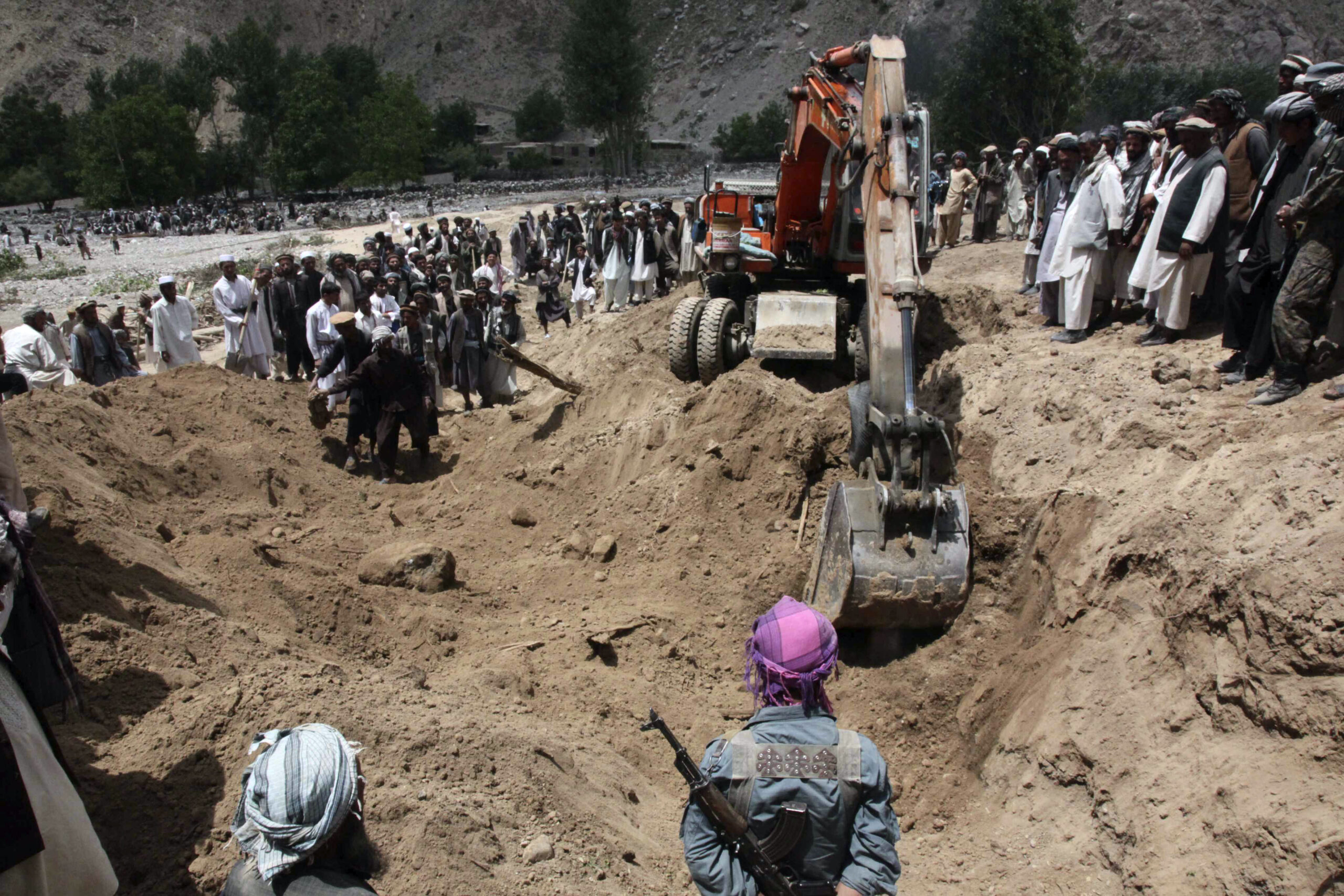 Bulldozers dig for victims of Afghan earthquakes