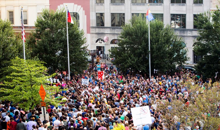 The protests were a response to the violent incident in Charlottesville, Va. (Casey Toth/The Herald-Sun via AP)