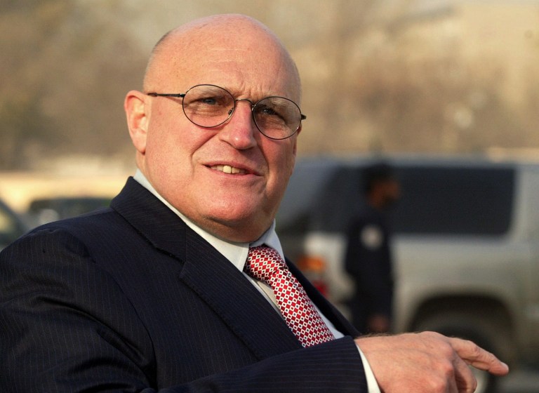 Richard Armitage, the deputy secretary of state under Bush from 2001 to 2005, said he will be voting for Hillary Clinton over Donald Trump in November. (AP Photo/Gurinder Osan)