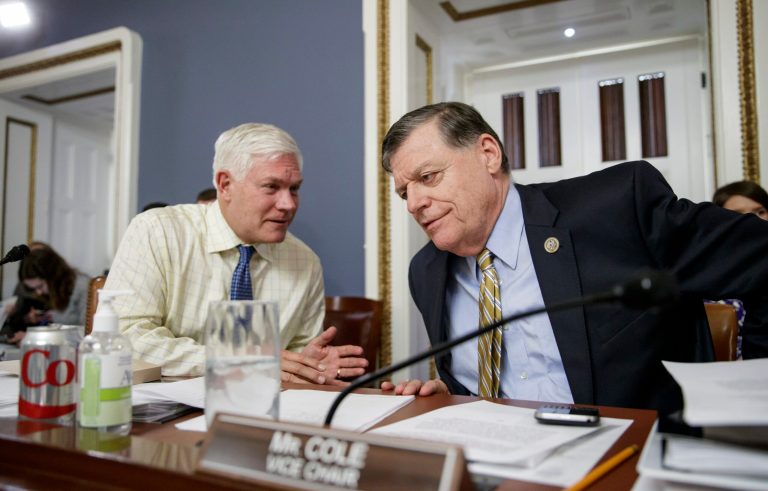 House Rules Committee Chairman Pete Sessions, R-Texas, left, confers with vice chair Rep. Tom Cole, R-Okla., about a rule governing debate and voting on the Republican bill to repeal and replace Obamacare. (AP Photo/J. Scott Applewhite)
