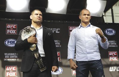 Jae C. Hong/AP
Heavyweight champion Cain Velasquez, left, and No. 1 contender Junior dos Santos will face each other on network TV onSaturday.