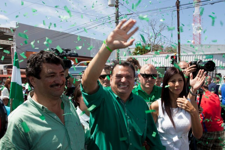 Johnny Araya, presidential candidate for the National Liberation Party, PLN, waves to supporters outside a polling station, after voting in the general election in San Jose, Costa Rica, Sunday, Feb. 2, 2014. The ruling PLN has been beset by infighting and corruption allegations and Araya, now faces three rivals, which experts say could splinter Sunday's vote. Araya, who has been the mayor of the capital of San Jose since 2003, must overcome the discontent over high unemployment during President Laura Chinchilla's government. (AP Photo/Moises Castillo)