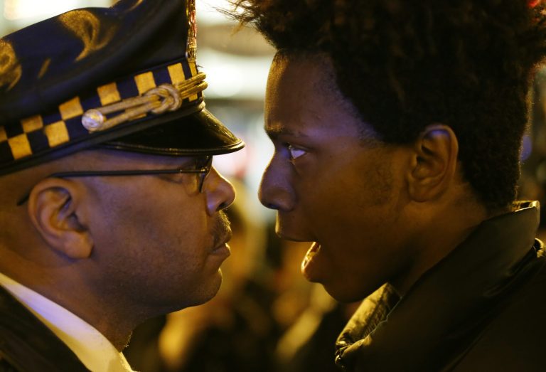 One young protester was filmed staring down police officers, getting right in their faces and occasionally shouting, 