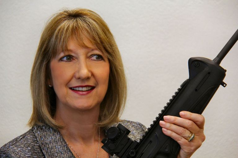 Asked if they were unable to find a photo of the specific firearm mentioned by Anita Staver, Orlando Weekly told the Washington Examiner's media desk they went with the picture of her holding a rifle because it was, 