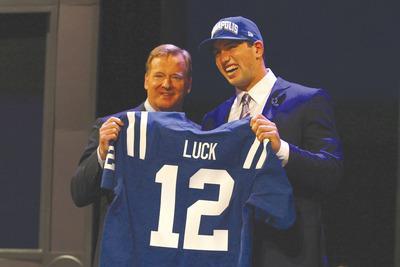 Al Bello/Getty Images
Stanford quarterback Andrew Luck was taken by the Indianapolis Colts with the first pick in the NFL Draft on Thursday to become Peyton Manning's replacement.