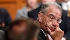 Why was Chuck Grassley wearing two pairs of glasses?