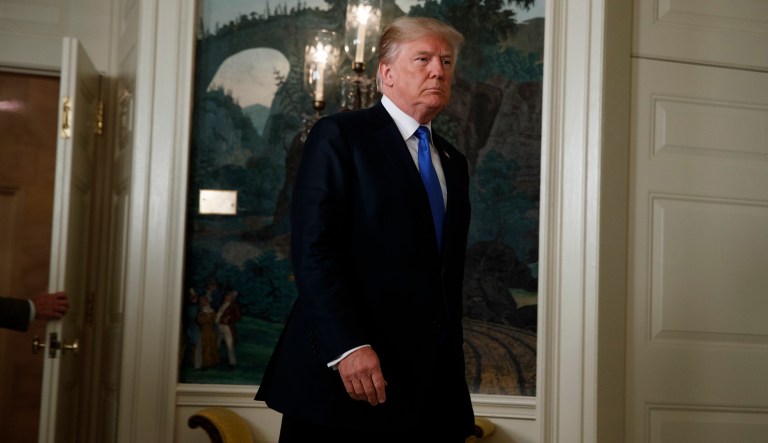 President Donald Trump prepares to give a speech in the White House, Friday, Oct. 13, 2017, in Washington. (AP Photo/Evan Vucci)