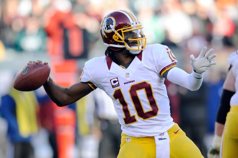 Washington Redskins' Robert Griffin III passes in the second half of an NFL football game against the Philadelphia Eagles, Sunday, Dec. 23, 2012, in Philadelphia. Washington won 27-20. (AP Photo/Michael Perez)
