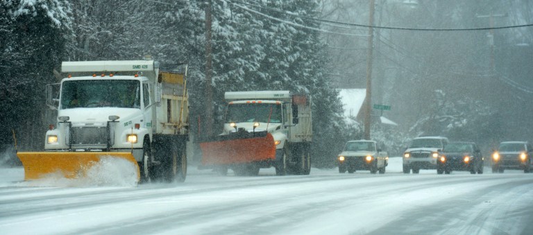 Snow plows lead traffic down Monroe Road as a winter storm moves into the area in Matthews, N.C., on Feb. 12.ÃÂ The White House on Wednesday said that the Federal Emergency Management Agency had mobilized its response centers as a severe winter storm moved up the East Coast.ÃÂ (AP Photo/The Charlotte Observer, Jeff Siner)