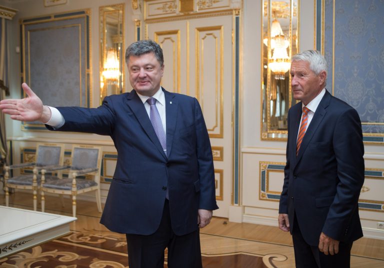 Ukrainian President Petro Poroshenko,  left, welcomes Secretary-General of the Council of Europe Thorbjorn Jagland during a meeting in Kiev, Ukraine, Monday, Sept. 2, 2014. (AP Photo/Mykhailo Markiv, Presidential Press Service, pool)