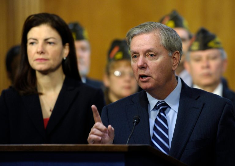 Sen. Lindsey Graham, R-S.C., right, accompanied by Sen. Kelly Ayotte, R-N.H., are among a group of senator demanding that the Obama administration release unclassified information on all current Guantanamo detainees. (AP Photo/Susan Walsh)