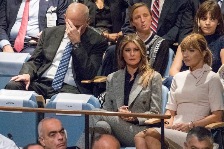 White House Chief of Staff John Kelly, left, reacts as he and First Lady Melania Trump listens as U.S. President Donald Trump speaks during the 72nd session of the United Nations General Assembly at U.N. headquarters, Tuesday, Sept. 19, 2017. (AP Photo/Mary Altaffer)