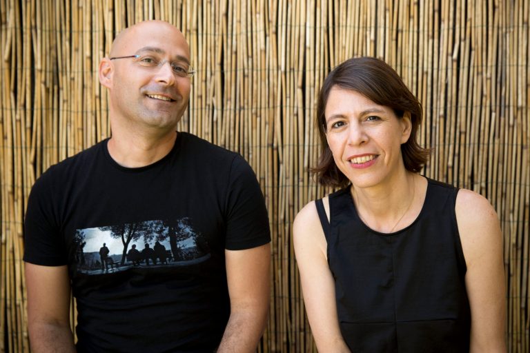 Directors Tal Granit, right, and Sharon Maymon pose for photographs following an interview with The Associated Press for their film The Farewell Party, during the 71st edition of the Venice Film Festival in Venice, Italy, Thursday, Aug. 28, 2014. (AP Photo/David Azia)
