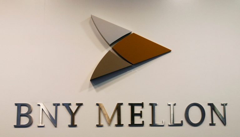 FILE - This Dec. 9, 2009 file photo shows a sign for Bank of New York Mellon in New York. Bank of New York Mellon, which has played a central role in the legal dispute that pushed Argentina into default last month, is no longer authorized to operate in the South American country, Argentina's government said Tuesday, Sept. 26, 2014. BNY Mellon has no retail operations in Argentina, so the government's announcement appeared to be part of a plan to remove it as a trustee and work around a U.S. court ruling that triggered a default on July 30. (AP Photo/Mark Lennihan, File)