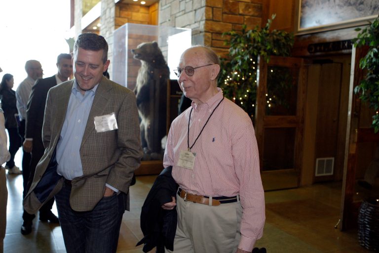 James Bullard, president of the Federal Reserve Bank of St. Louis, left, and Allan H. Meltzer, professor at Carnegie Mellon University, at the lunch break of the Economic Policy Symposium at Jackson Hole in Moran, Wyo., Friday, Aug. 26, 2011. (AP Photo/Reed Saxon)