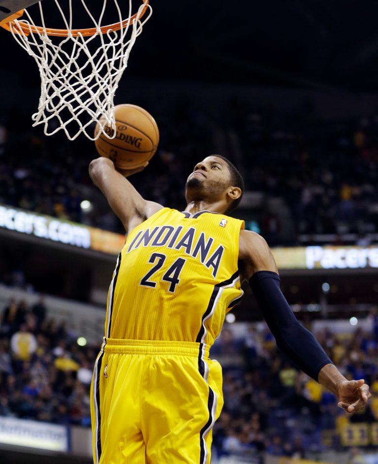   Indiana Pacers' Paul George goes in for a dunk during the second half of an NBA basketball game against the Memphis Grizzlies, Monday, Dec. 31, 2012, in Indianapolis. Indiana won 88-83. (AP Photo/Darron Cummings)  