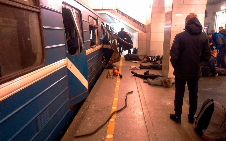 Blast victims lie near a subway train hit by a explosion at the Tekhnologichesky Institut subway station in St.Petersburg, Russia. (AP Photo/DTP&ChP St. Peterburg via AP)