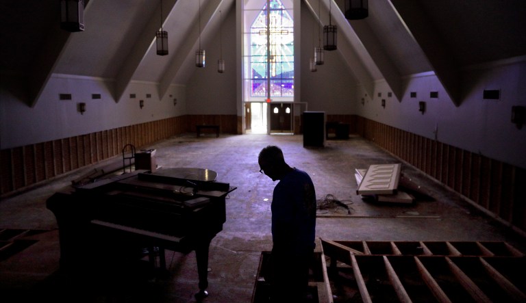 Several places of worship were hit hard by hurricanes this year, but religious organizations have faced obstacles applying for federal disaster relief funds. (AP Photo/David Goldman)
