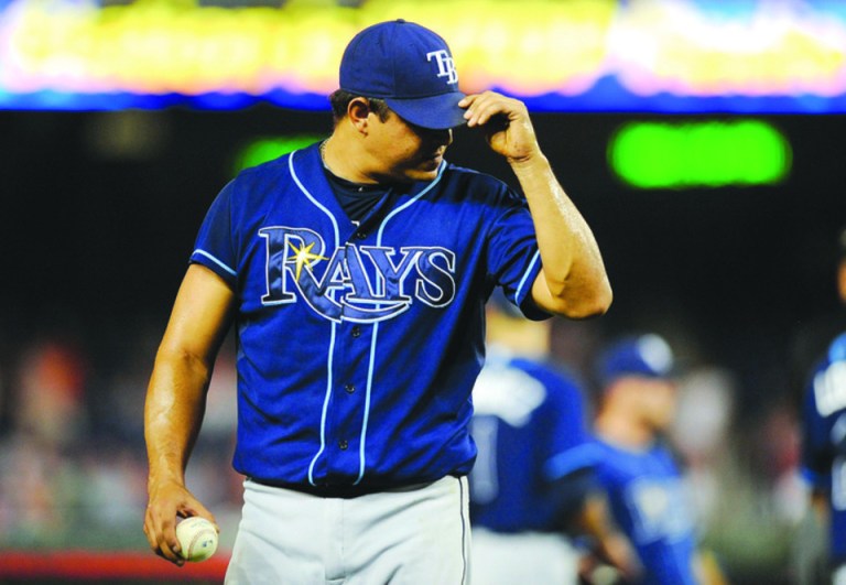 Patrick McDermott/Getty Images
Rays reliever Joel Peralta was ejected for having pine tar on his glove Tuesday night.