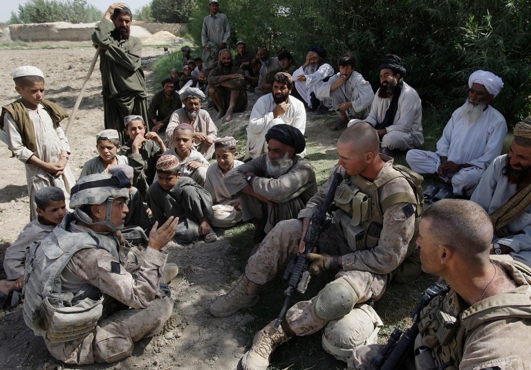 Neither the House nor the Senate defense policy bills increase the number of visas available for Afghan translators who worked with U.S. troops, which could leave 6,000 translators unable to come to the U.S., even though they were promised that benefit for their service. (AP Photo/David Guttenfelder, File)