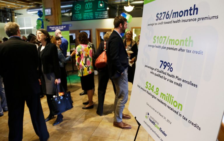 A new survey shows that while more people are getting coverage, many workers who get insurance from their employers are paying a lot more for healthcare.Â (AP Photo/Ted S. Warren)