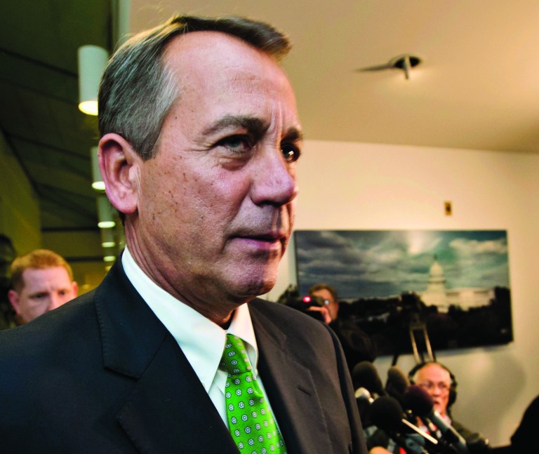 FILE - This Jan. 1, 2013 file photo shows House Speaker John Boehner of Ohio walkig past reporters after a closed-door meeting meeting of House Republicans on Capitol Hill in Washington. The GOP-controlled House will vote next week to permit the government to borrow more money to meet its obligations, a move aimed at heading off a market-rattling confrontation with President Barack Obama over the so-called debt limit. Full details aren't settled yet, but the measure would give the government about three more months of borrowing authority beyond a deadline expected to hit as early as mid-February, a Republican official said Friday. (AP Photo/J. Scott Applewhite, File)