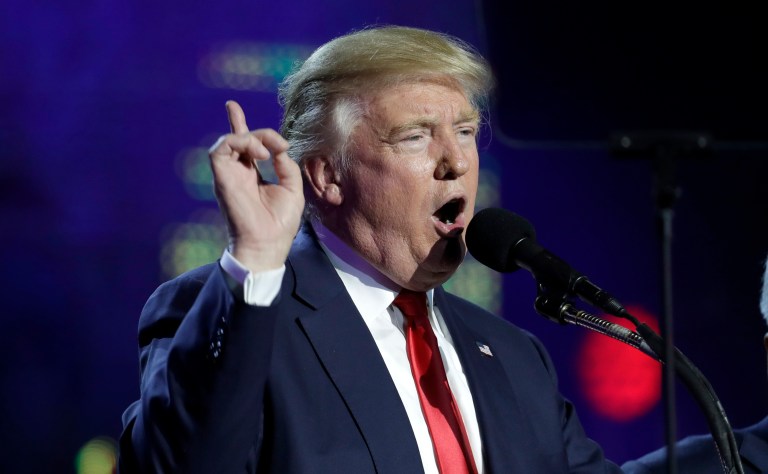 President-elect Trump accused the media of failing to report the charitable work carried out by his charity foundation. (AP Photo/Julio Cortez)