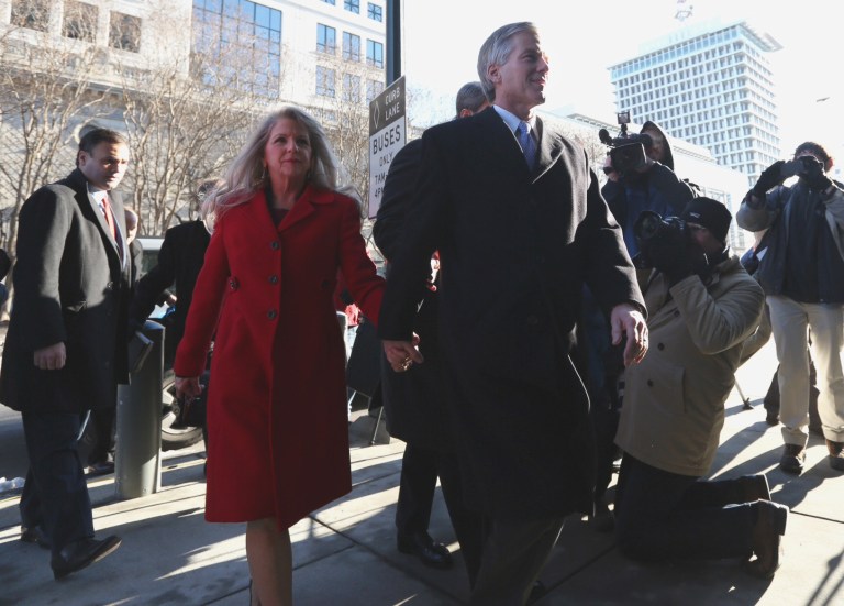 Former Virginia Gov. Bob McDonnell and his wife Maureen arrive at the U.S. District Court in Richmond on Jan. 24 for their bond hearing and arraignment on federal corruption charges. Federal prosecutors allege that the McDonnells accepted more than $165,000 worth of loans and gifts from Jonnie Williams, the former head of Star Scientific Inc.  (AP Photo/The Virginian-Pilot, Steve Earley) 